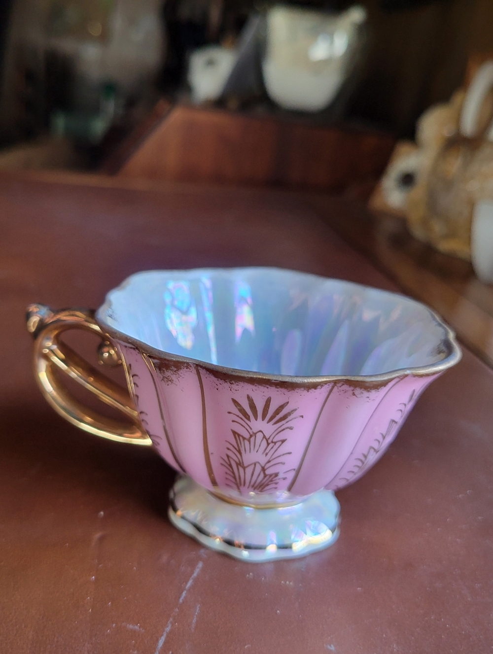 vintage pink and gold lusterware tea cup